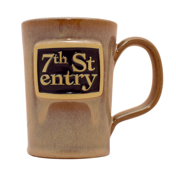 Brown Deneen Pottery mug with '7th St entry' logo 