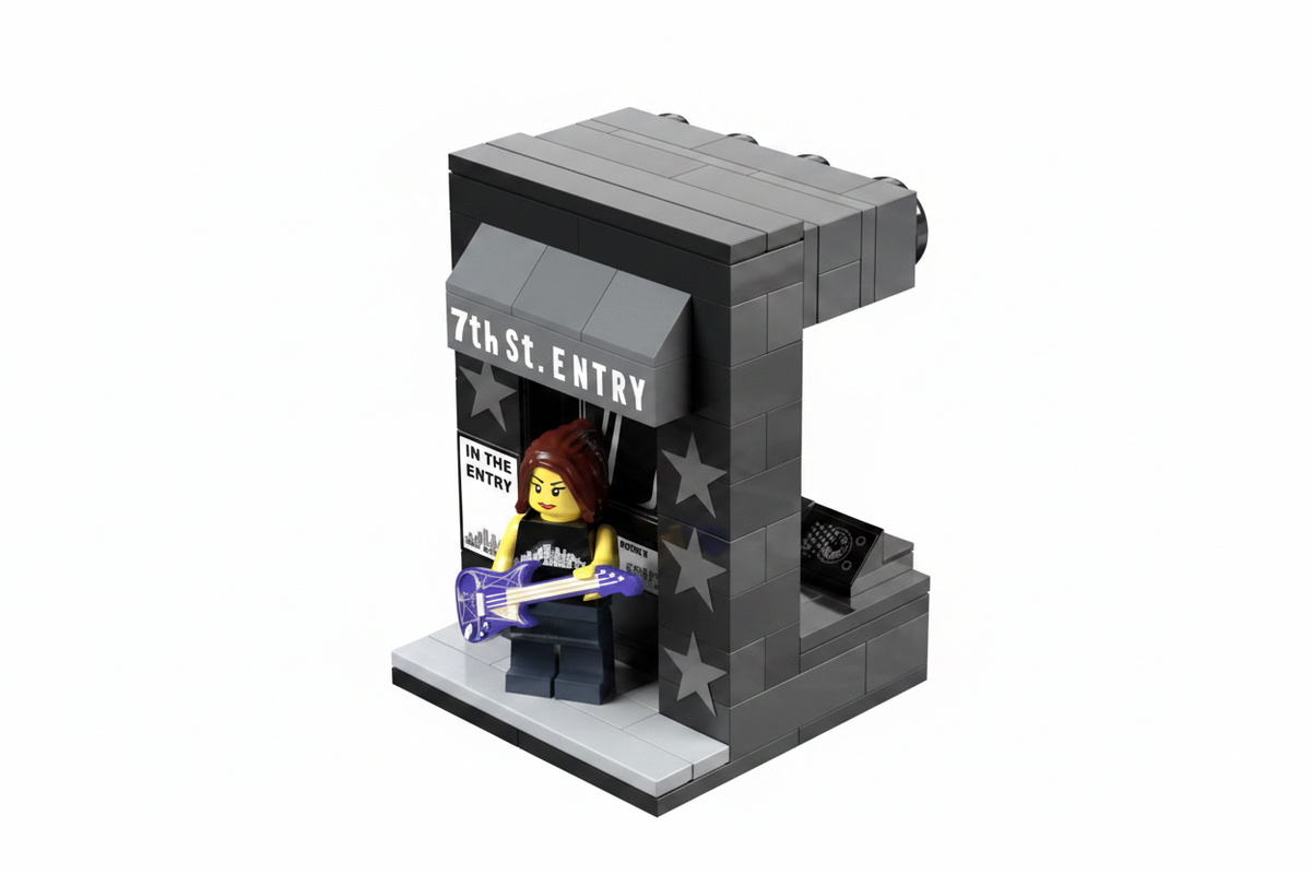 Front side of 7th St Entry Brickmania model - features the 7th St Entry awning and a poster next to the door.