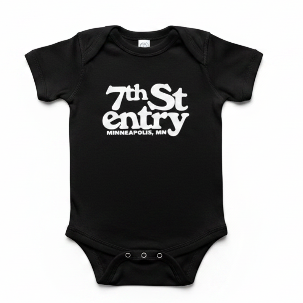A black short-sleeve baby onesie with the 7th St Entry logo screenprinted in white on the chest.