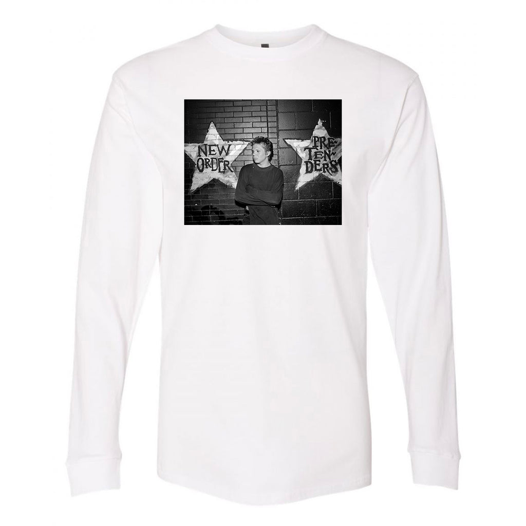 White long-sleeve shirt with an Alec Soth photo of a person outside First Avenue between two stars.