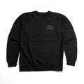 Black crewneck sweatshirt with a simply styled FIRST AVENUE embossed in black in the left pocket area.