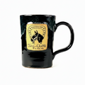 A glossy black stoneware mug with a distressed, textured glaze and a pottery-toned 'Turf Club' logo on the front.